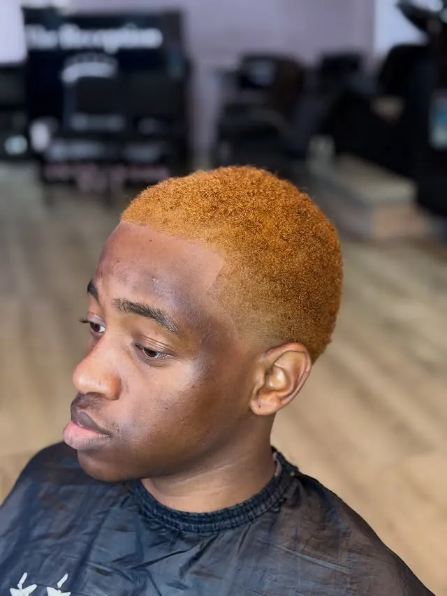 Creative copper haircut finished at Dictator's Barbershop
